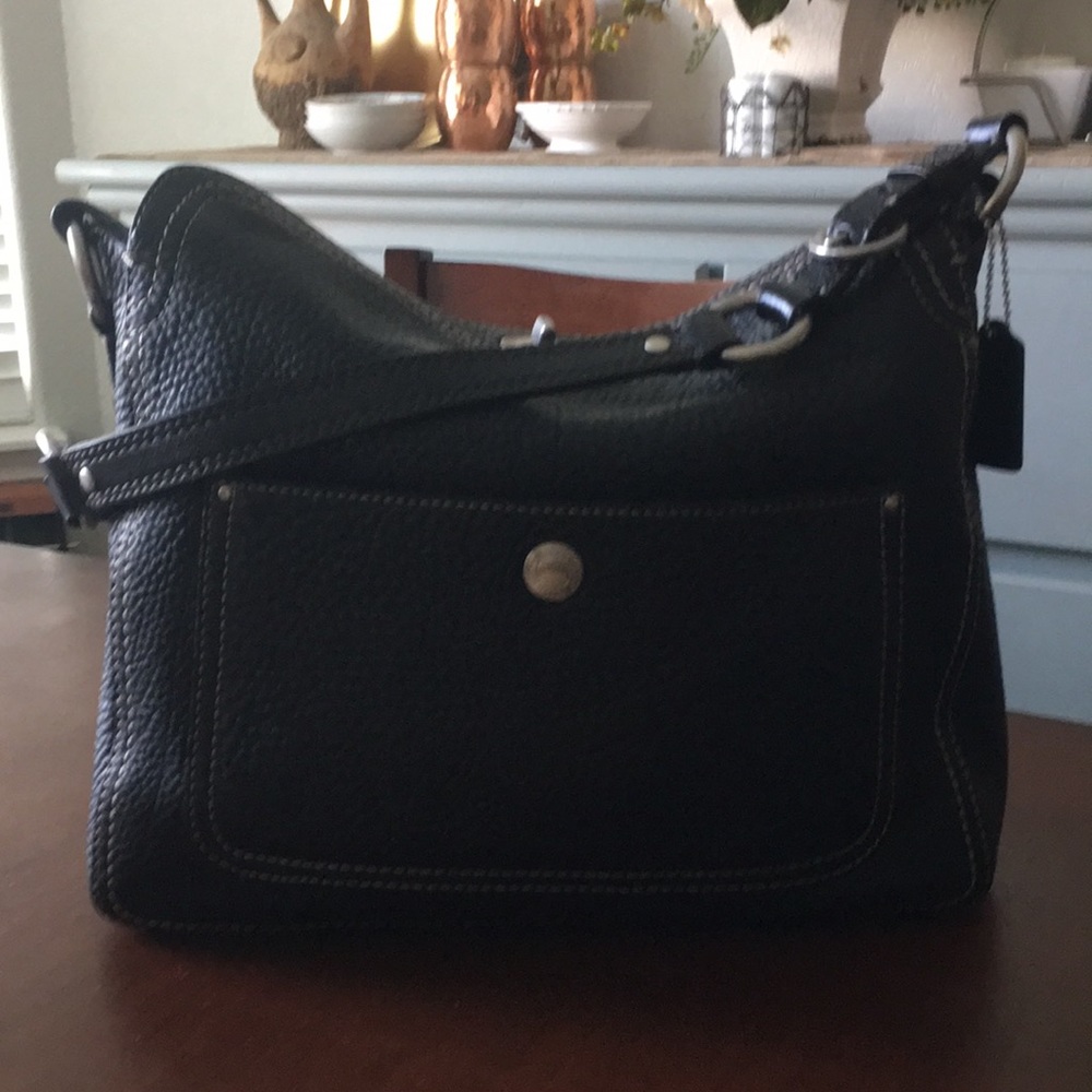 Coach purse Black pebbled leather gently used